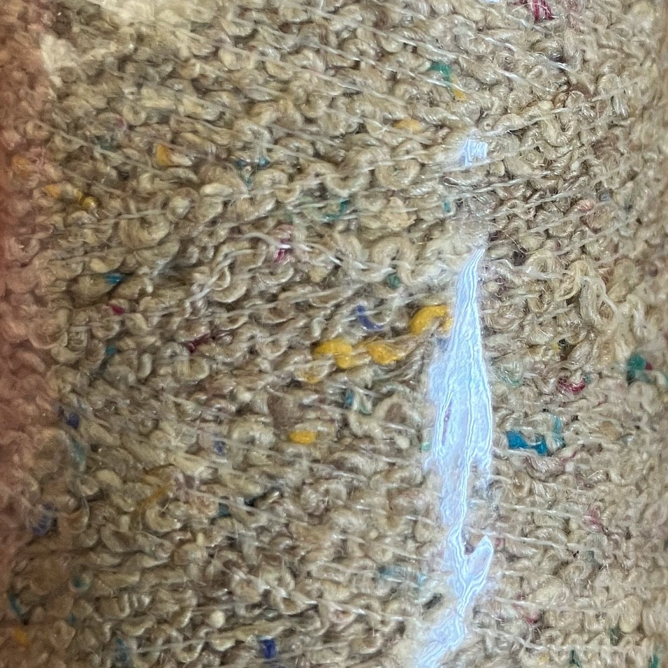 Close up of light brown boucle yarn