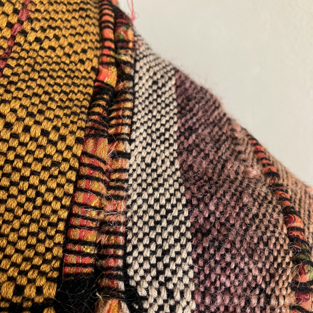 Detail of orange silk fabric inlay