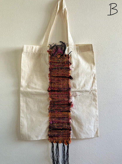 Beige cotton bag embellished with vertical strip of multicolored silk