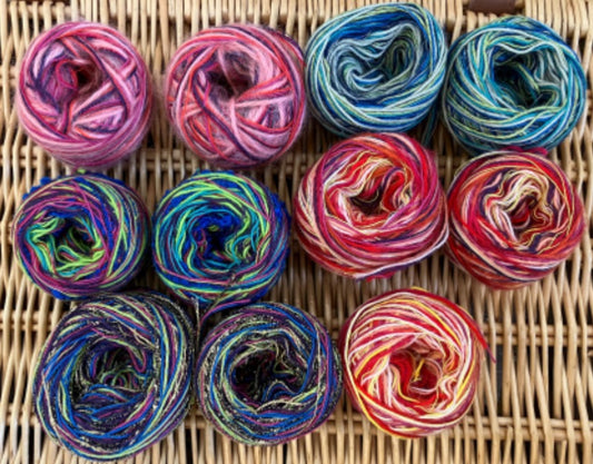 11 balls of mixed color and mixed fiber yarn