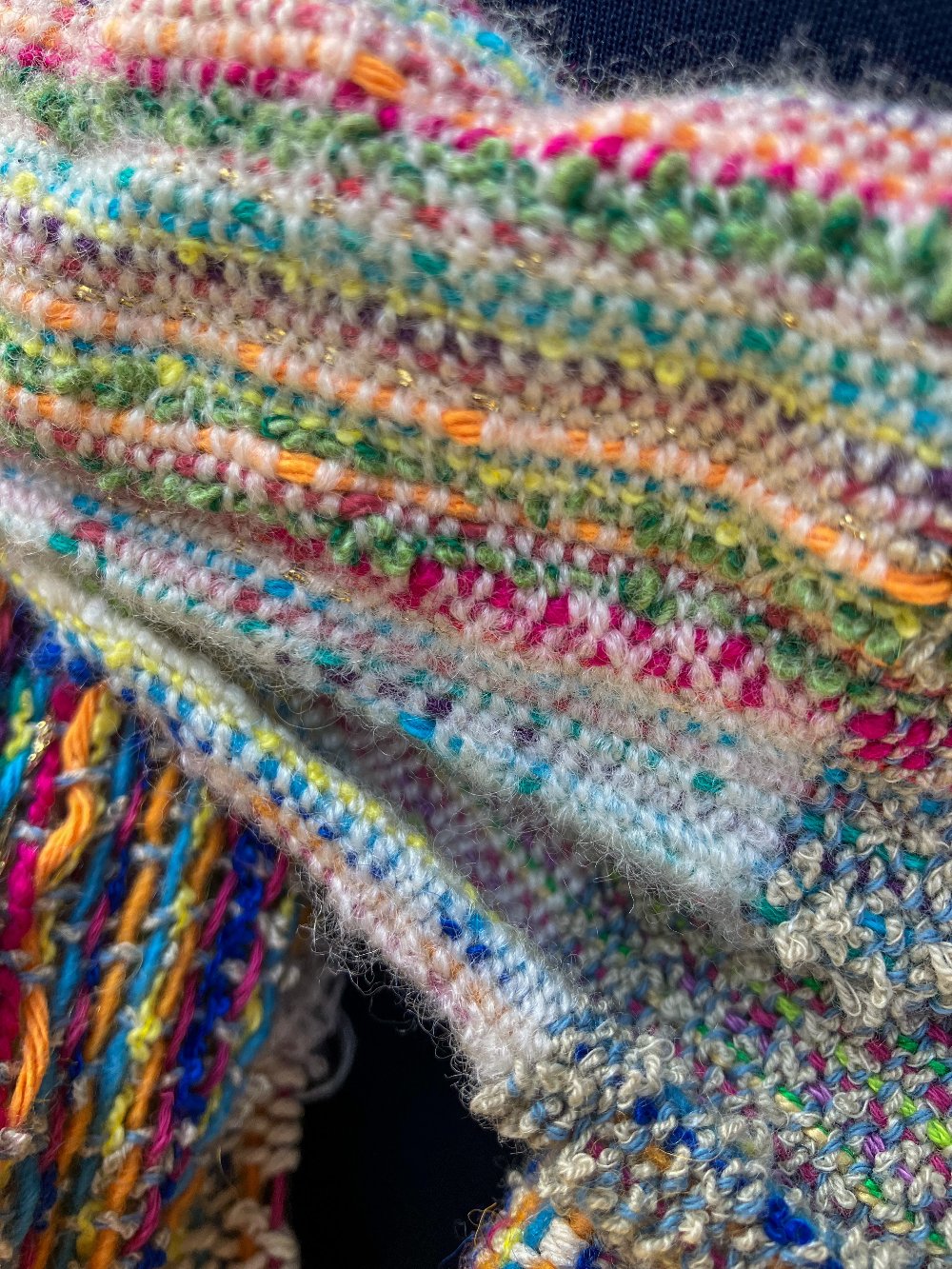 Closeup of fibers of colorful summer scarf