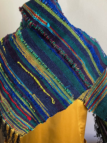 Asymmetrical back of shawl scarf in vibrant neon and jewel tones