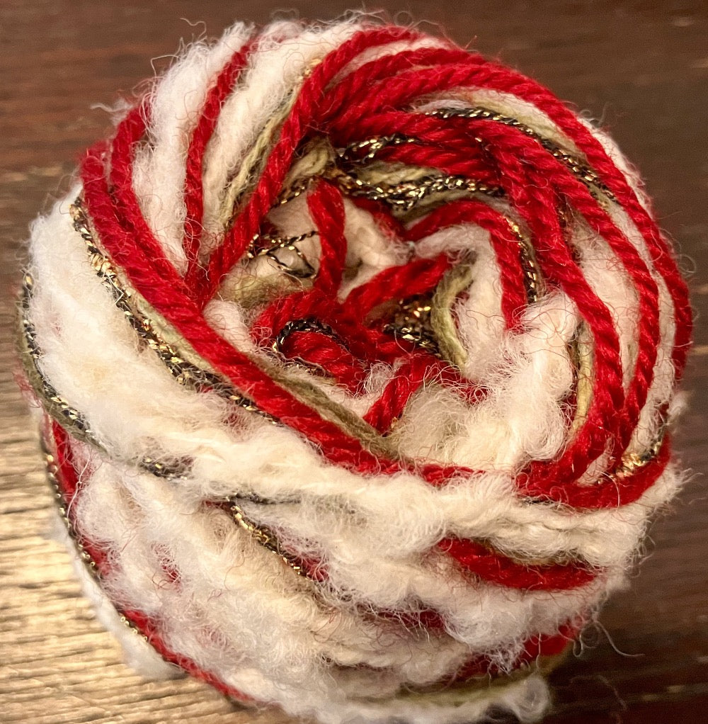 Red, white, and sparkly mixed fiber yarn