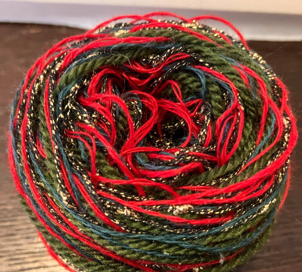 Red, green, and sparkly mixed fiber yarn